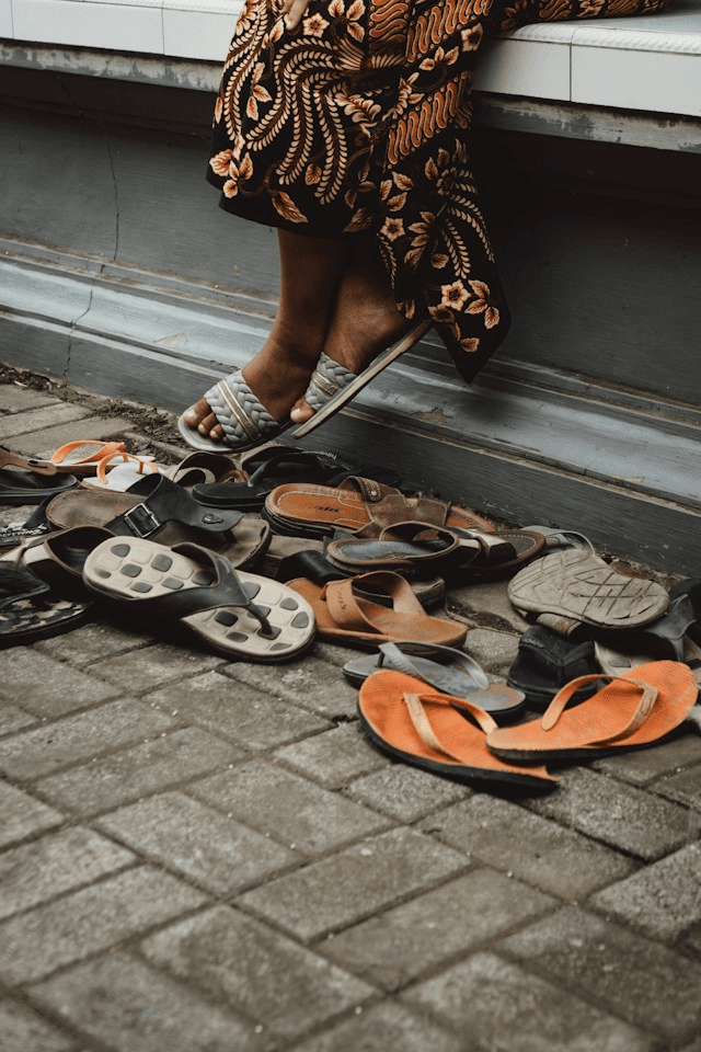 A Pool of Shoes Outside the Masjid